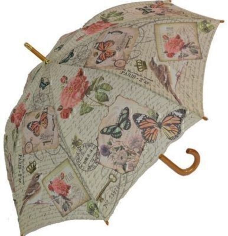 Beautiful stick umbrella with automatic opening, 8 fibreglass ribs and a smart hooked wooden handle. The fabric is wonderfully illustrated with an amazingly detailed stunning butterfly design. Brass ferrule, wooden tips and a Velcro fastener make this co